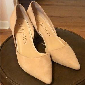Nude colored suede pumps